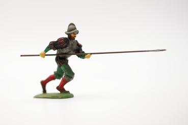 Landsknecht preceding Spanish helmet