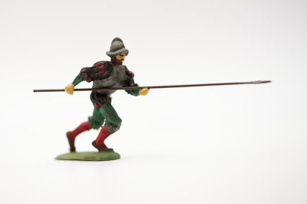Landsknecht preceding Spanish helmet