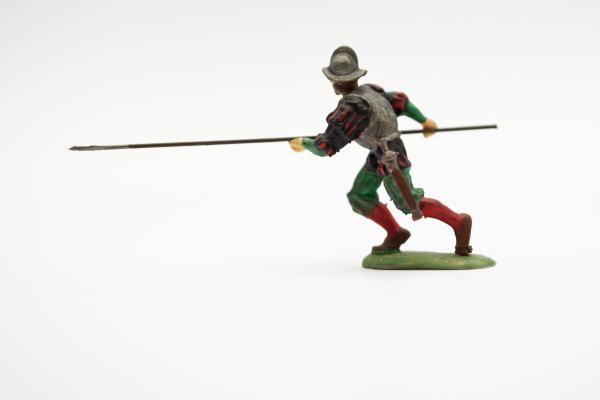 Landsknecht preceding Spanish helmet